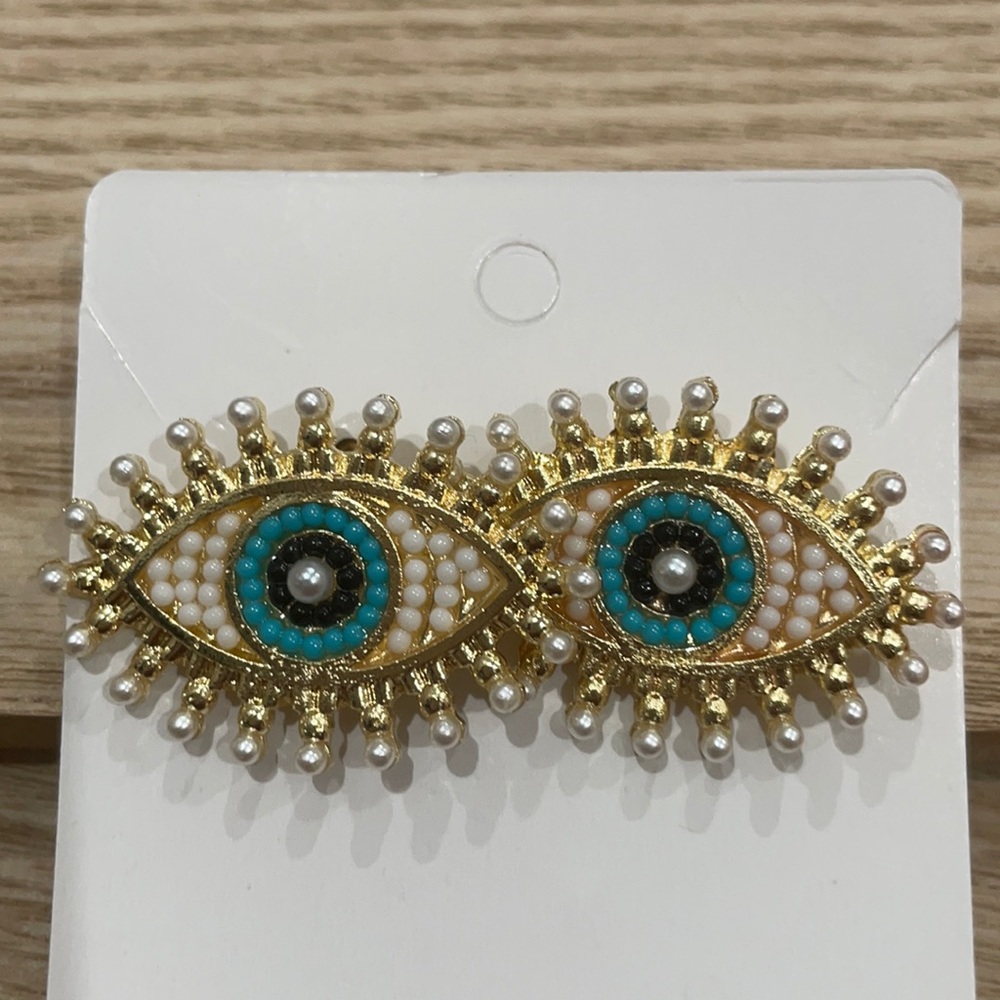White with gold color base evil eyes